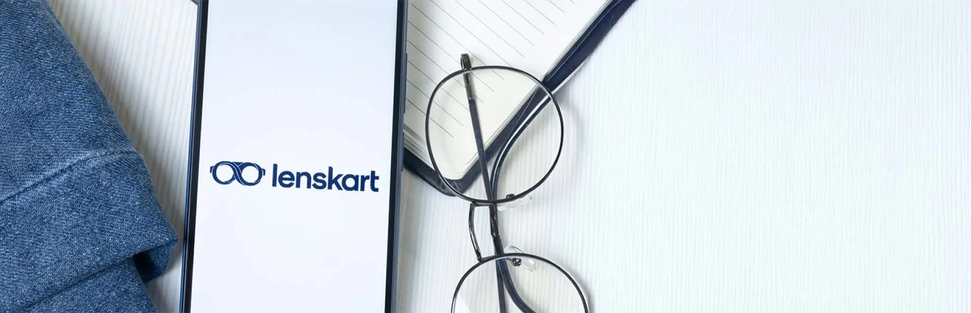 Image du Logo lenskart sur un écran de téléphone, icône de l'entreprise.